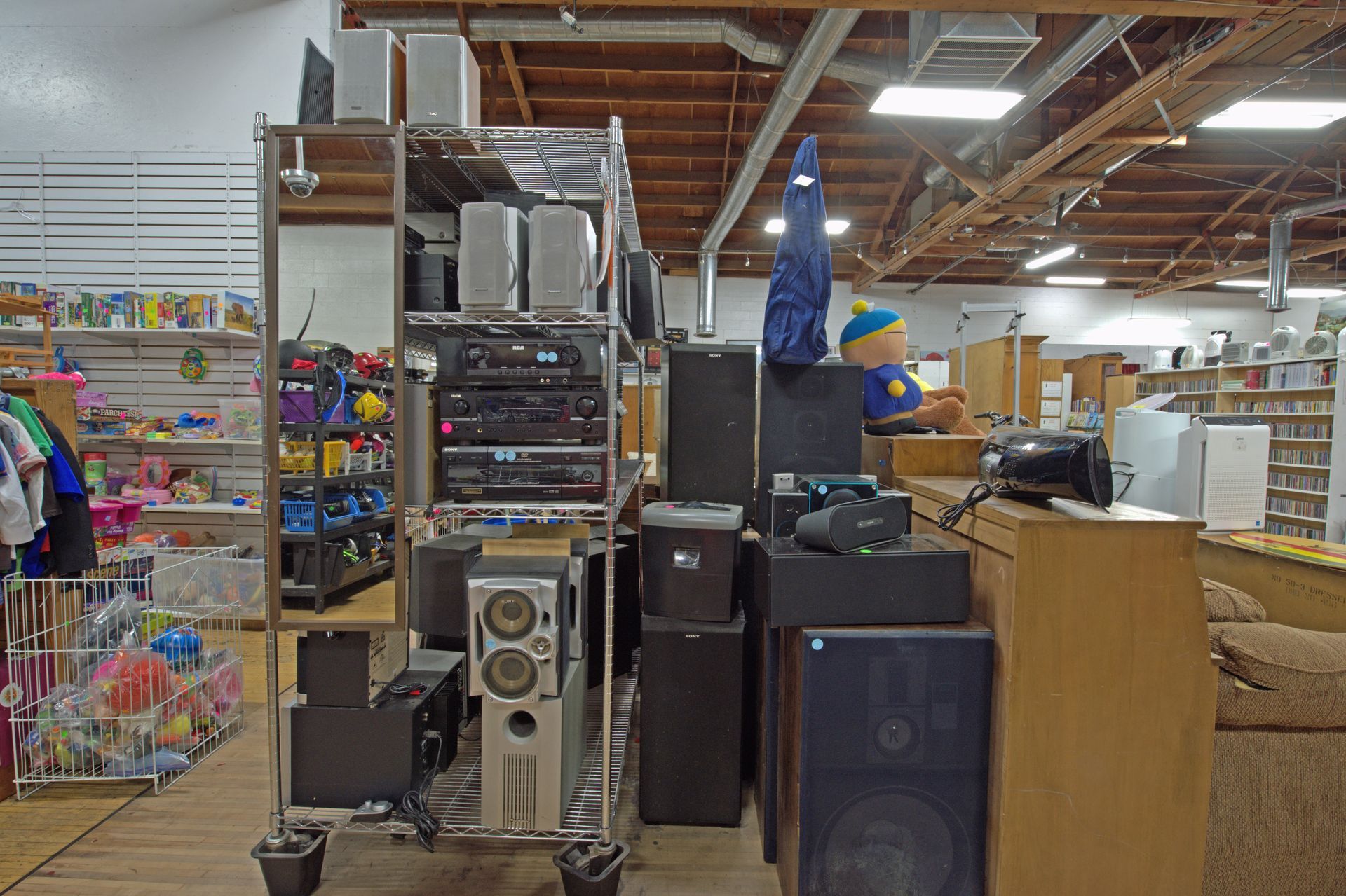 A store filled with lots of electronics and toys