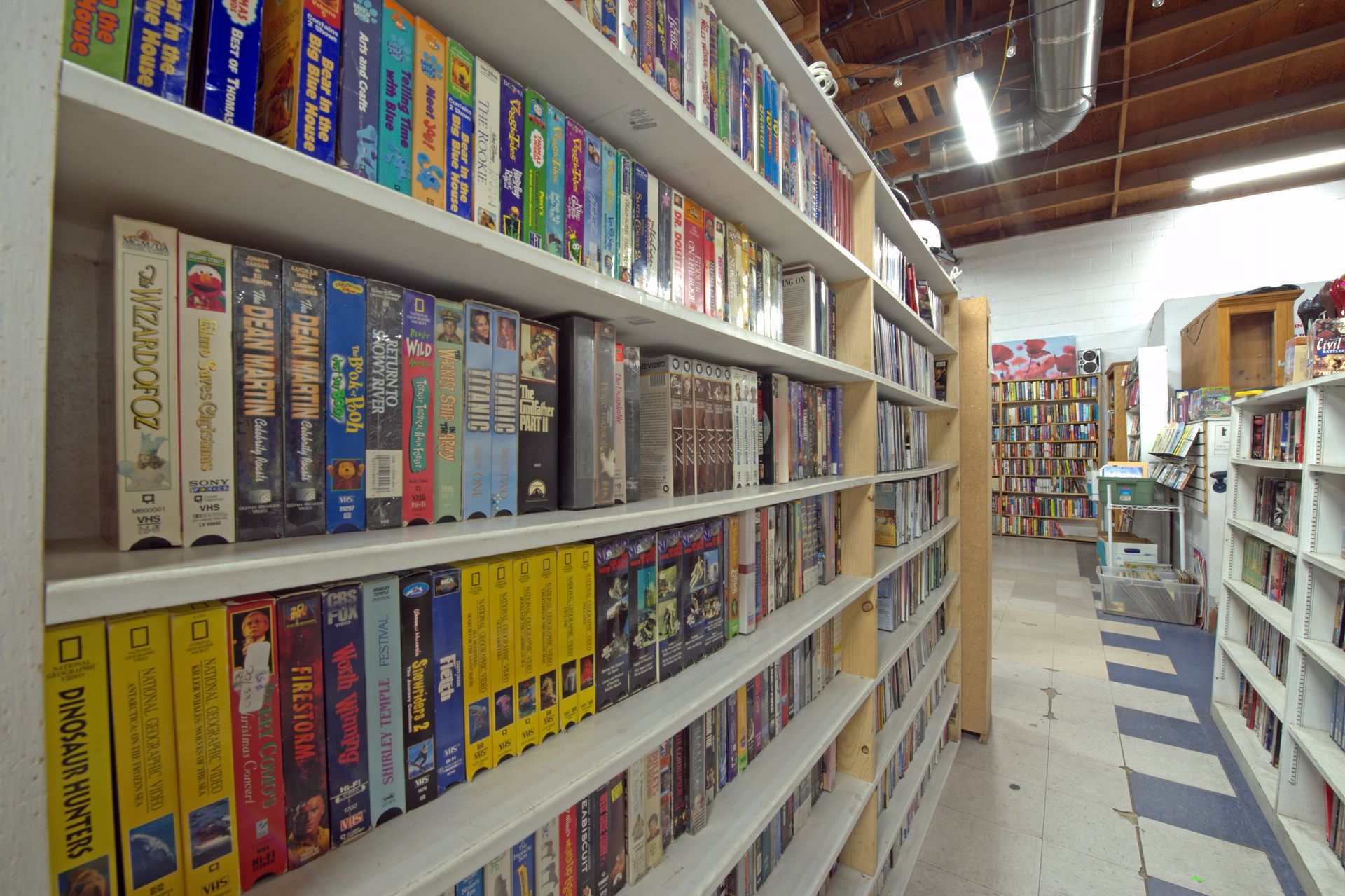 A book store filled with lots of books including harry potter